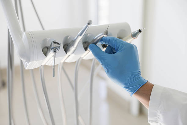 Professional Tooth Extraction technician working in Meridian, TX